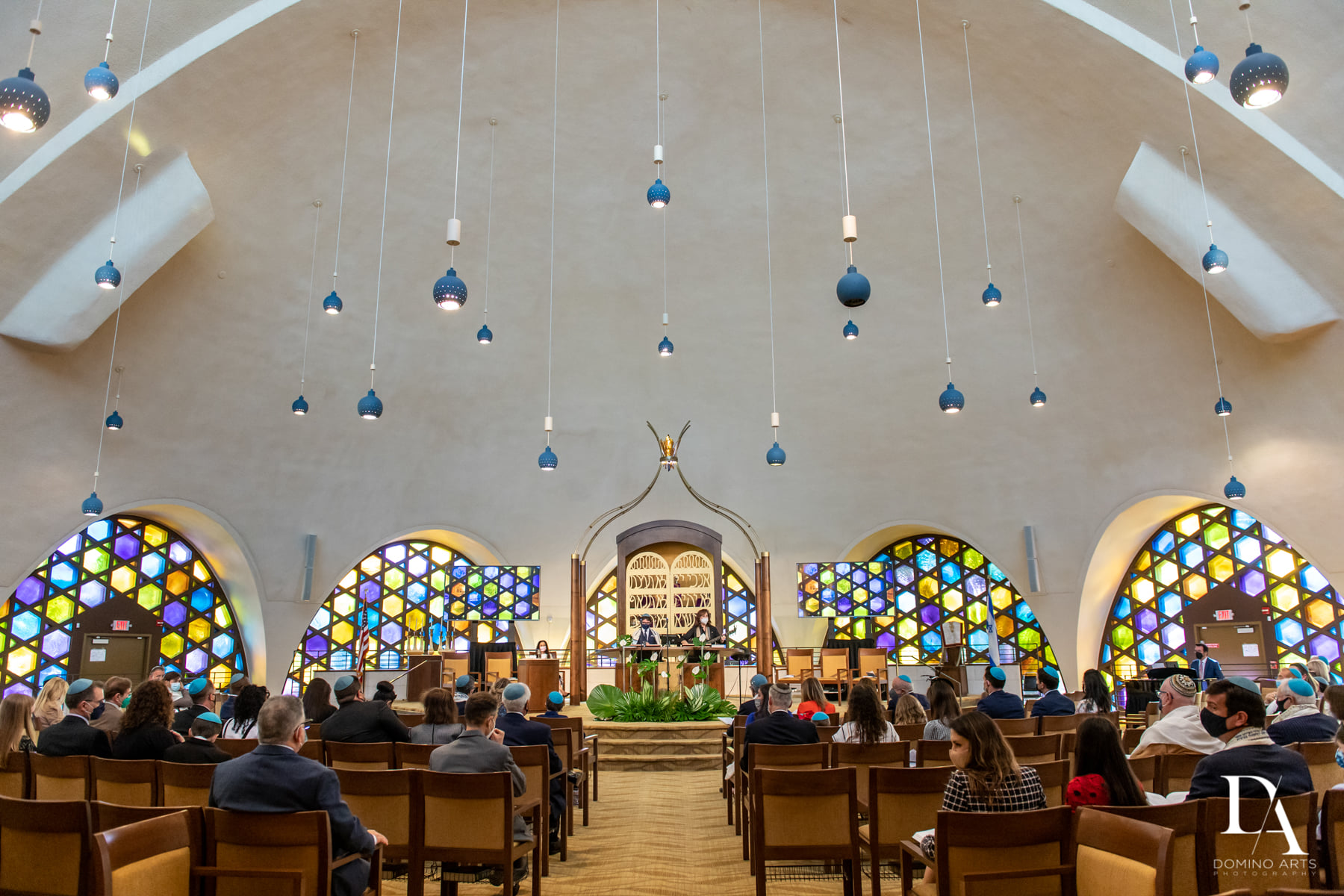 A church with people sitting in the pews